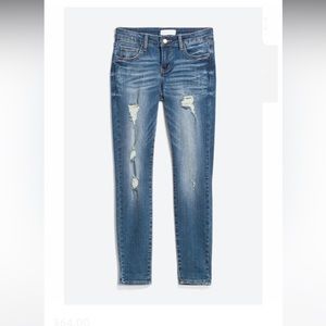 Mid rise skinny distressed jeans